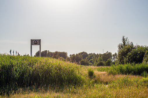 Gothenburg, Sweden - July 14 2021: Volkswagen logo on a pylon in a field.