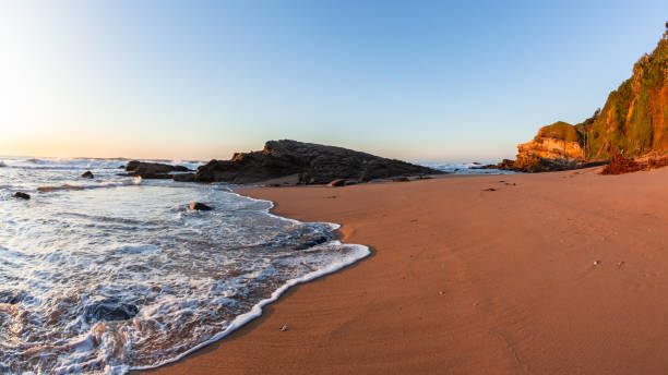 istock Beach Sand Wave Wash Rocky Coastline 1405857900