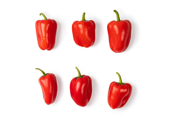 Set of Red sweet mini peppers, paprika isolated on a white background. Heap, group of mini bell peppers. Set of Red sweet mini peppers, paprika isolated on a white background. Heap, group of mini bell peppers. Vegan diet food. Top view. red bell pepper stock pictures, royalty-free photos & images