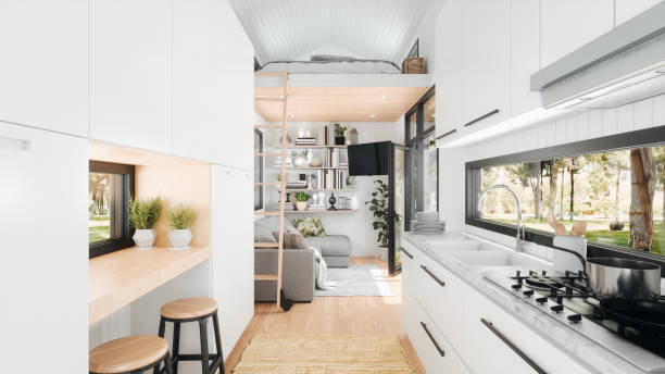 tiny house moderne innenarchitektur - wohngebäude innenansicht stock-fotos und bilder