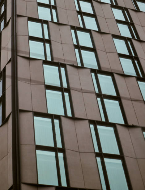 istock Building photo architecture cream with medium windows 1405862850