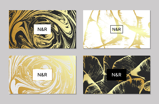 Visiting card templates with golden, black and white abstract liquid painted decoration. Marble textured background