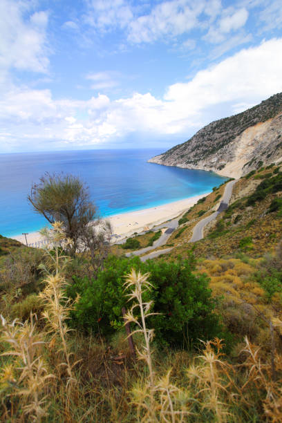 View on white pebbles Myrtos beach from hill, Kefalonia island, Ionian Sea, Greece
