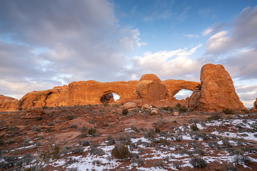Time with the help of the sun, rain and wind, has shaped this boulder making it unique. Arches National Park is a national park in eastern Utah in the United States. The park is adjacent to the Colorado River 4 miles (6 km) north of Moab, Utah.