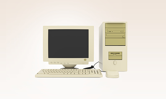 Old vintage desktop computer With keyboard and mouse. Old fashioned desktop PC. Retro style personal computer. 3D Rendered Illustration.