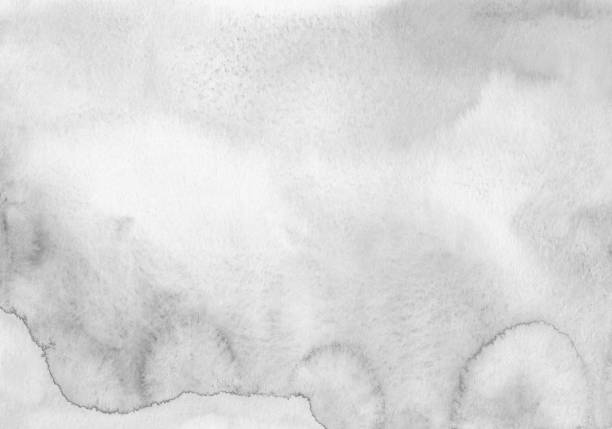 istock Watercolor liquid pastel grey background. Stains on paper 1405875226