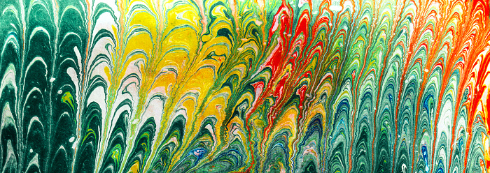Abstract multicolored drawing with paints on the water. Abstract background. Banner. Ebru technique.