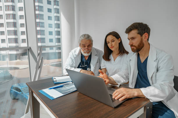 istock Successful medical doctors are discussing diagnosis during the conference 1405876985