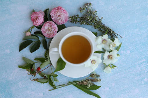Herbal tea with flowers frame