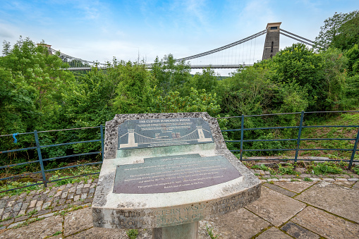 Clifton Suspension Bridge, Bristol, England - June 19, 2022:  The Clifton Suspension Bridge was built between 1831 and 1864 and is designed by Isambard Kingdom Brunel. The bridge  is one of Bristol’s most recognisable structures. It marks a turning point in the history of engineering and has come to symbolise a city of original thinkers and independent spirit. The Bridge is open 24 hours a day, seven days a week, 365 days of the year.