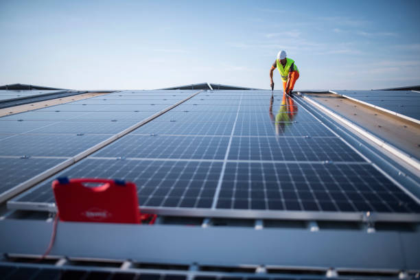 istock Installing solar panels on roof, green energy. 1405880248