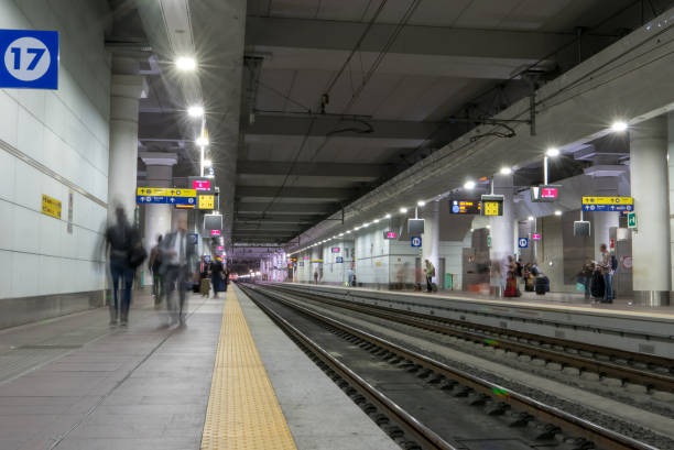 istock Motion in the busy train station platform 1405882115