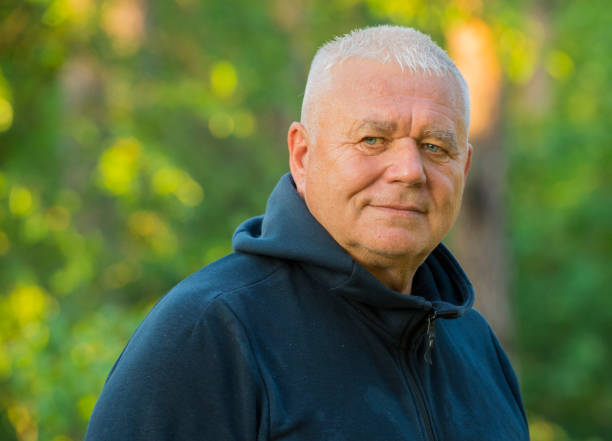 istock portrait of a handsome elderly man aged in the forest 1405883196