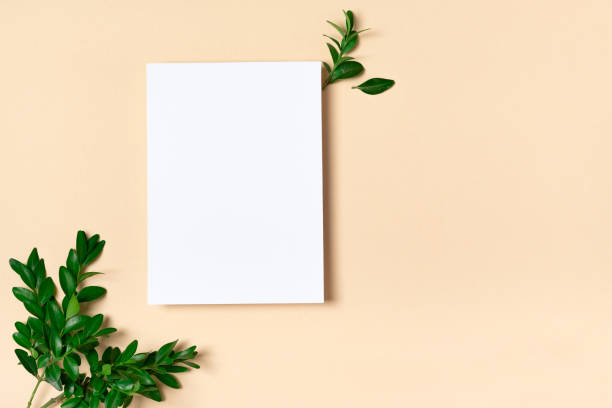 istock Rectangular vertical or square invitation white greeting card mockup with a boxwood branch 1405887717