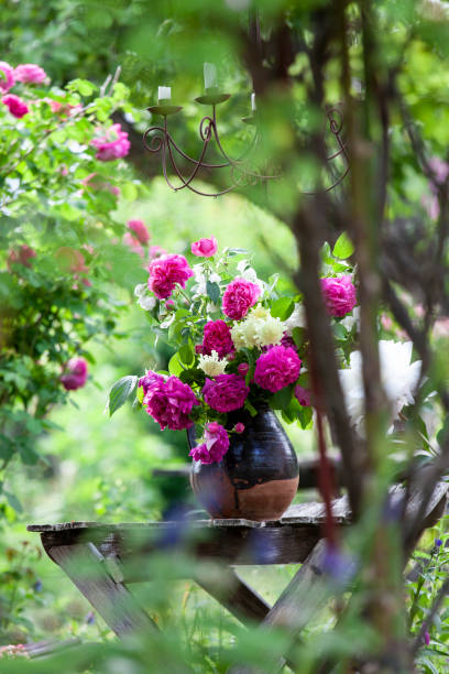 istock Bouquet with roses, outdoors in the garden 1405888665