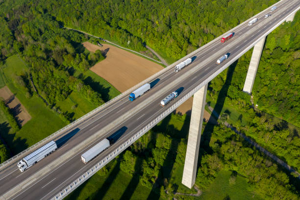 istock Traffic on Highway Bridge, Aerial View 1405890569