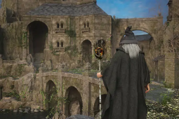 Photo of Old grey wizard stands before the bridge to a mystical fantasy castle. 3D illustration.