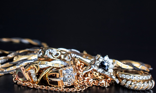 Fancy designer antique golden bracelets for woman fashion studio shot.
