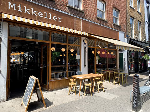 Street view of  Exmouth Market, a semi-pedestrianised street in Clerkenwell, Islington, and a famous street market with lots of cafes, restaurants, shops and bars.