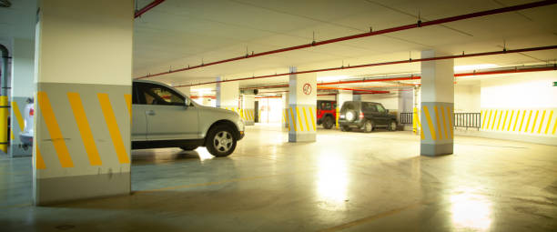 istock Cars on underground parking garage. 1405897318