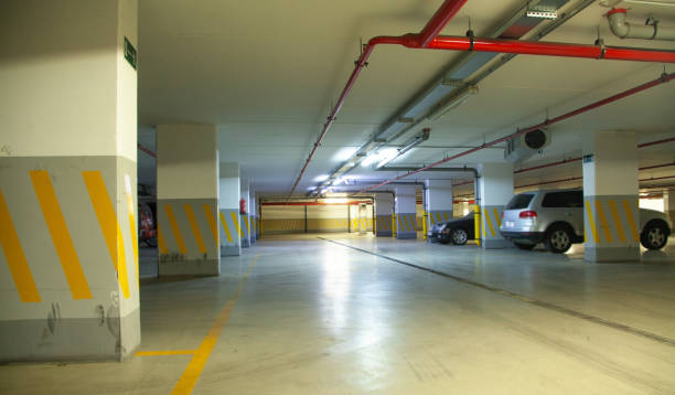 istock Cars on underground parking garage. 1405897319