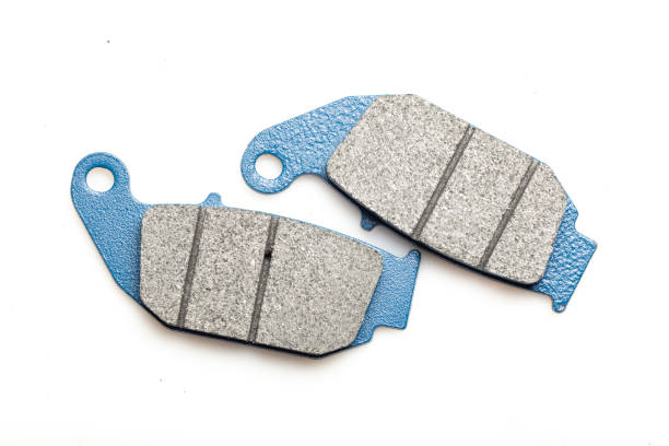 istock Motorcycle brake pads isolated on white background, close-up image 1405901818