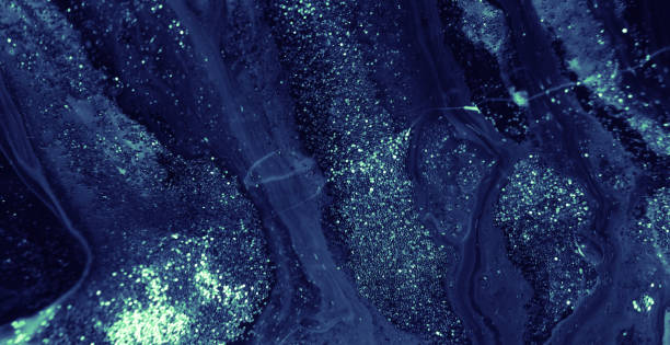 istock glitter fluid wet ink texture blue paint 1405906911