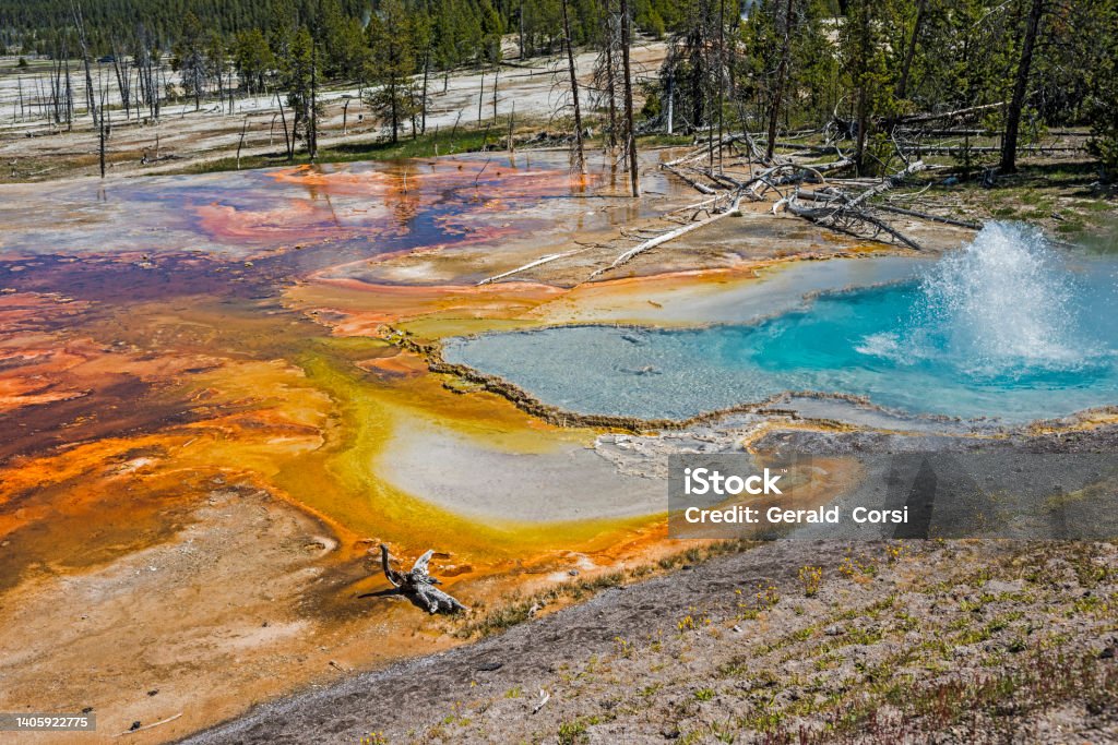 Firehole Spring on the Firehole Lake Drive in Lower Geyser Basin at Yellowstone National Park, Wyoming. Water Stock Photo