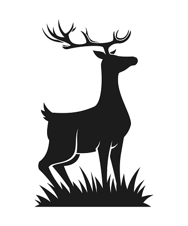Stylized silhouette of a reindeer standing in the grass - cut out vector icon, character or mascot