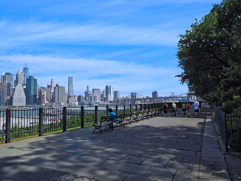 New York, NY - July 12, 2017:  The Brooklyn Heights Promenade is a 1,826-foot-long platform and pedestrian walkway with a great view of the Manhattan skyline