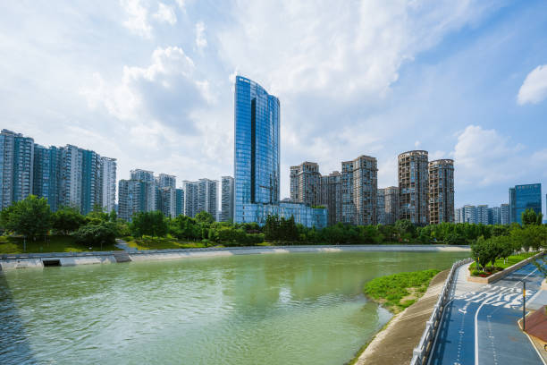 istock Sunny riverside bridge and Financial City 1405928711