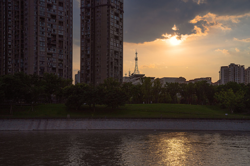 Riverside modern city at dusk