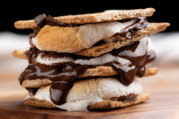 istock S'more with marshmallow and chocolate sandwiched between crackers. 1405930126