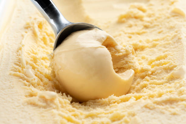 istock Scoop the vanilla ice cream with an ice cream scoop. 1405931034
