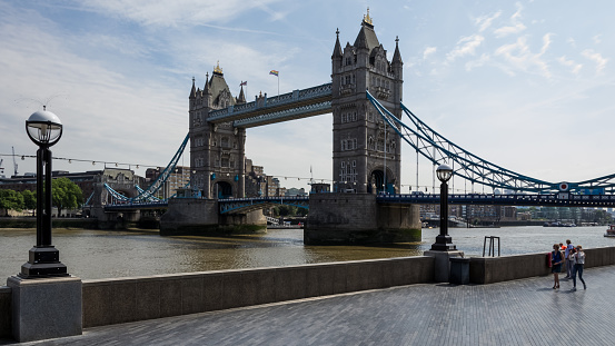 London, England – July 2018 – Architectural detail of The Queen's Walk a promenade located on the southern bank of the river Thames with the Tower Bridge in the background