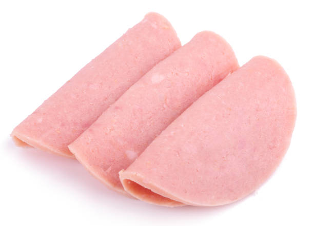 istock Sliced boiled tasty sausage isolated on white background 1405932638