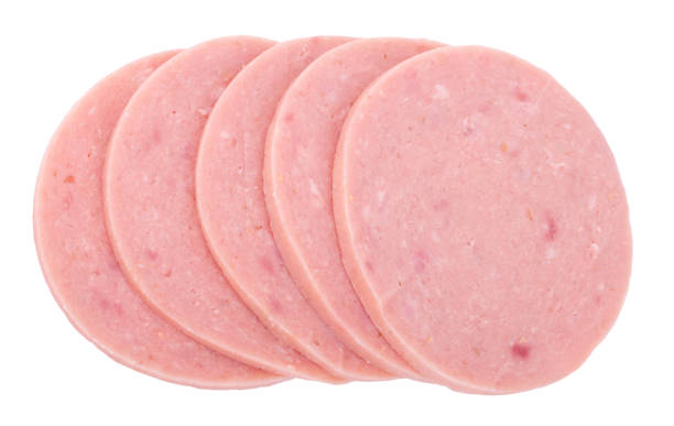istock Sliced boiled tasty sausage isolated on white background 1405932645