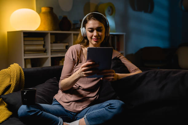 istock woman relaxing at home 1405944314