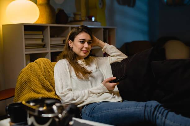 istock woman relaxing at home 1405944319