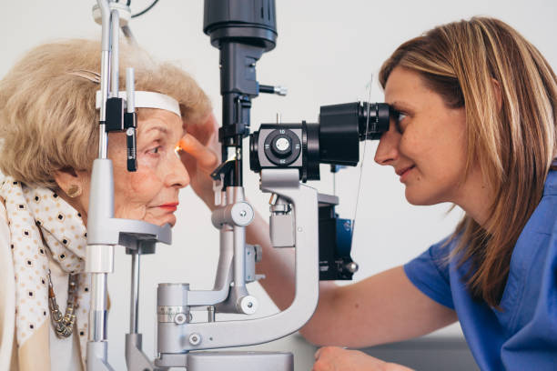 istock senior woman eyesight examination 1405944372