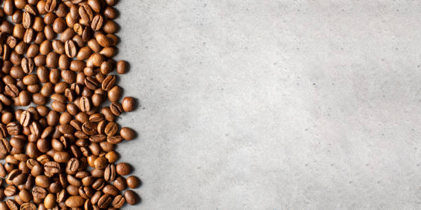 Background of roasted coffee beans full frame. Coffee-themed banner. Copy space