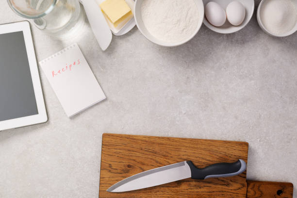 istock Notebook with recipes and products for cooking. 1405945612