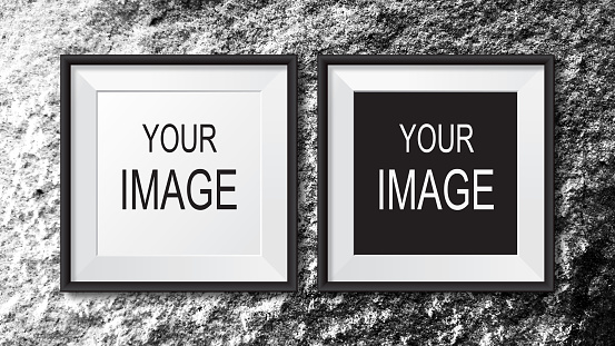 Blank picture frames on the wall for decorative pictures and advertisements.