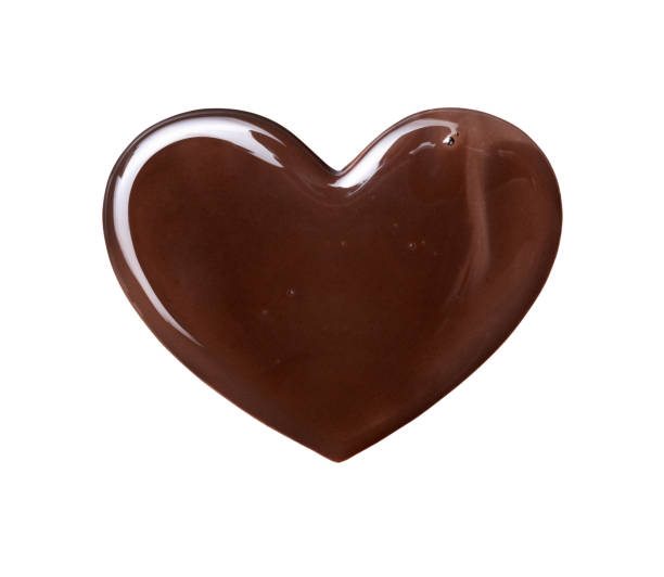 istock Chocolate candy in the shape of heart isolated on white background 1405947824