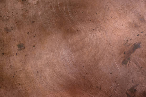 istock Copper background. Gradual oxidation. Scratches and stains. 1405949715