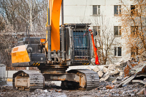 istock Hydraulic excavator works with debris at demolition site 1405950973