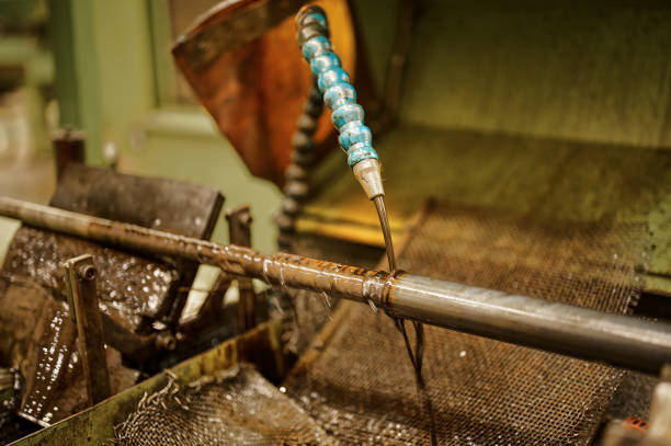 istock Liquid honing of drill rod with lubricant in workshop 1405951089