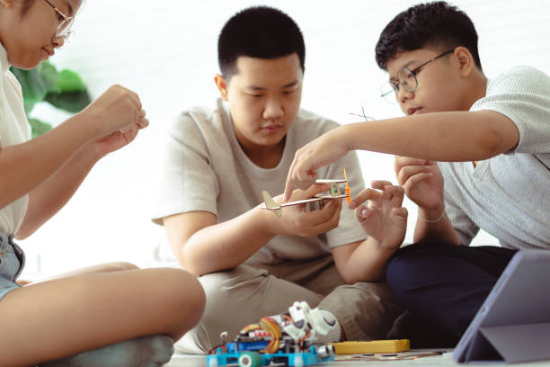 istock Students Making Robot Car in Technology Class Bangkok, Thailand 1405951602