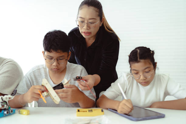 istock Students Making Robot Car in Technology Class Bangkok, Thailand 1405951689