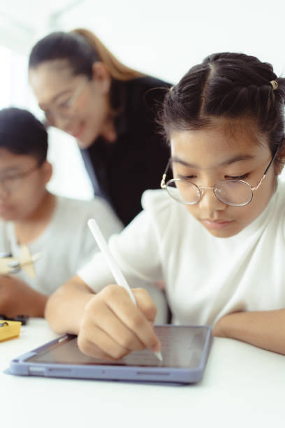 istock Students Making Robot Car in Technology Class Bangkok, Thailand 1405951702